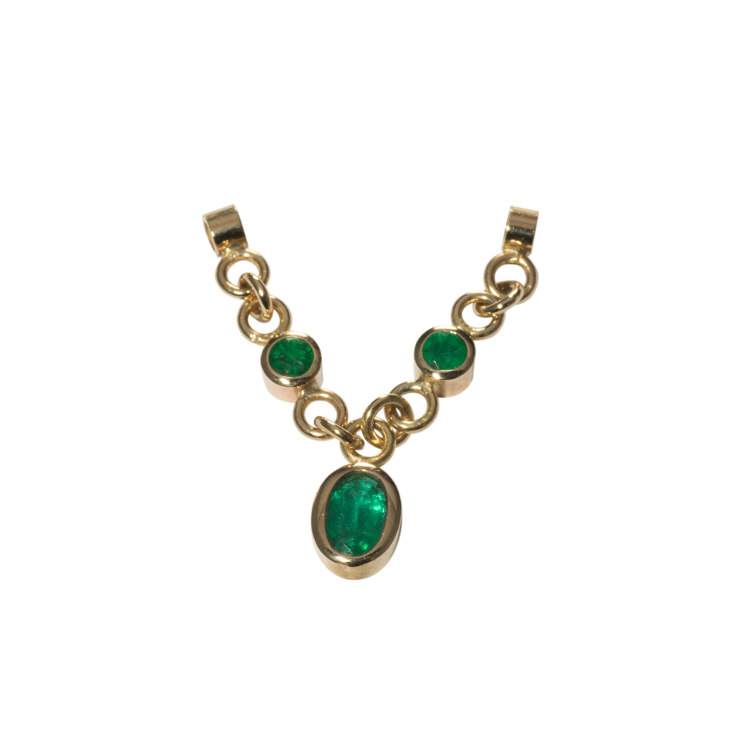 Nipple pendant yellow gold 750/000 with emeralds