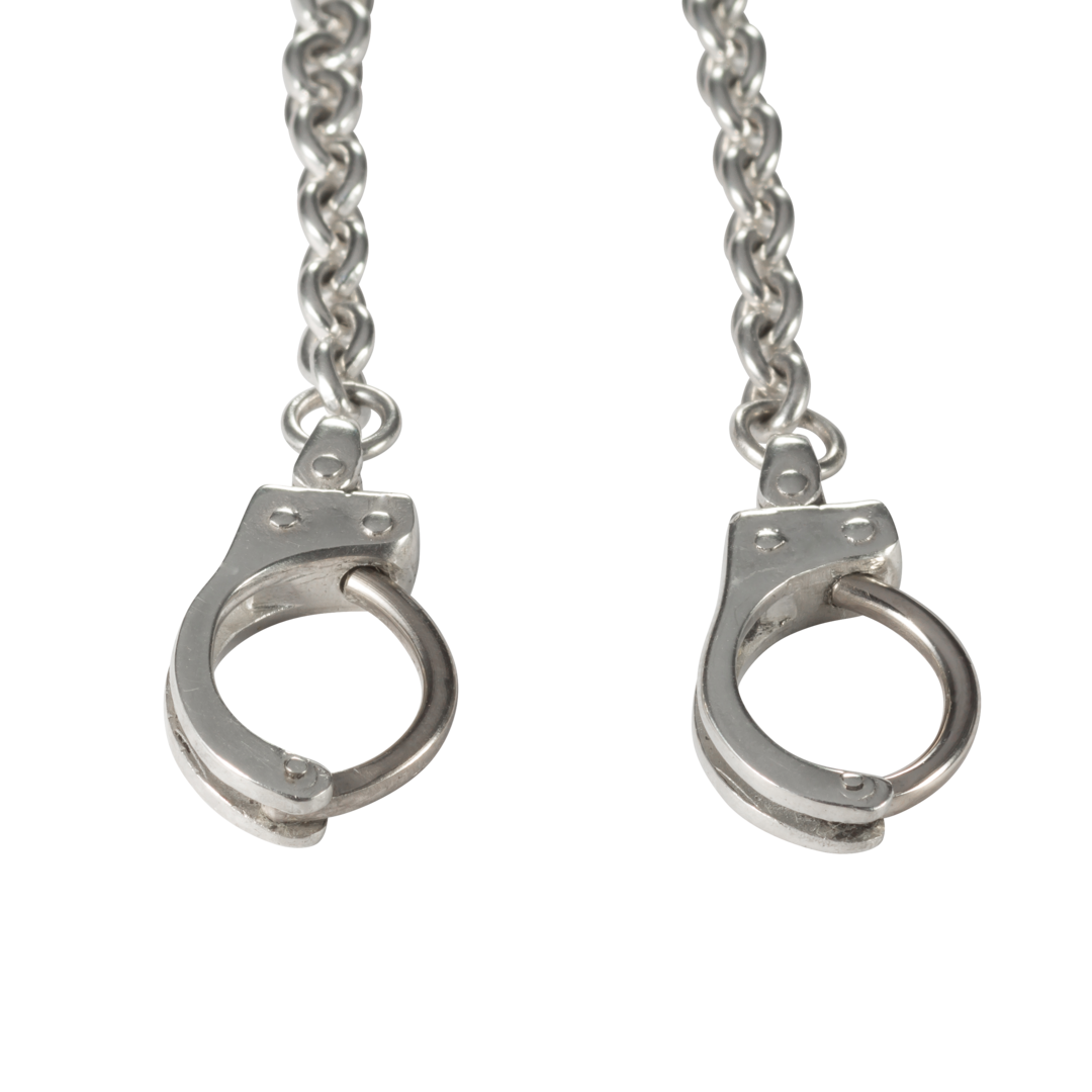 Breast Piercings as Handcuffs with a connecting Chain