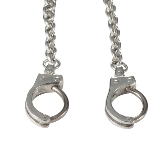 Breast Piercings as Handcuffs with a connecting Chain