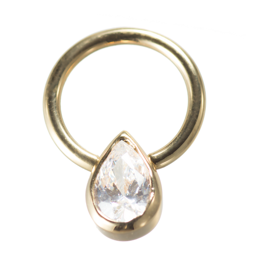 Piercing ring with a drop-shaped stone