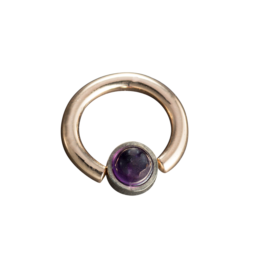 Piercing ring with an Amethyst Cone
